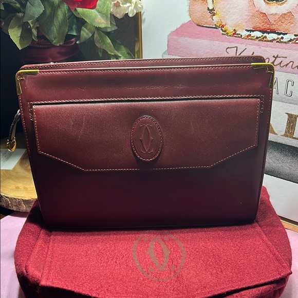 Cartier Handbags - Cartier Must De Cartier Clutch EUC